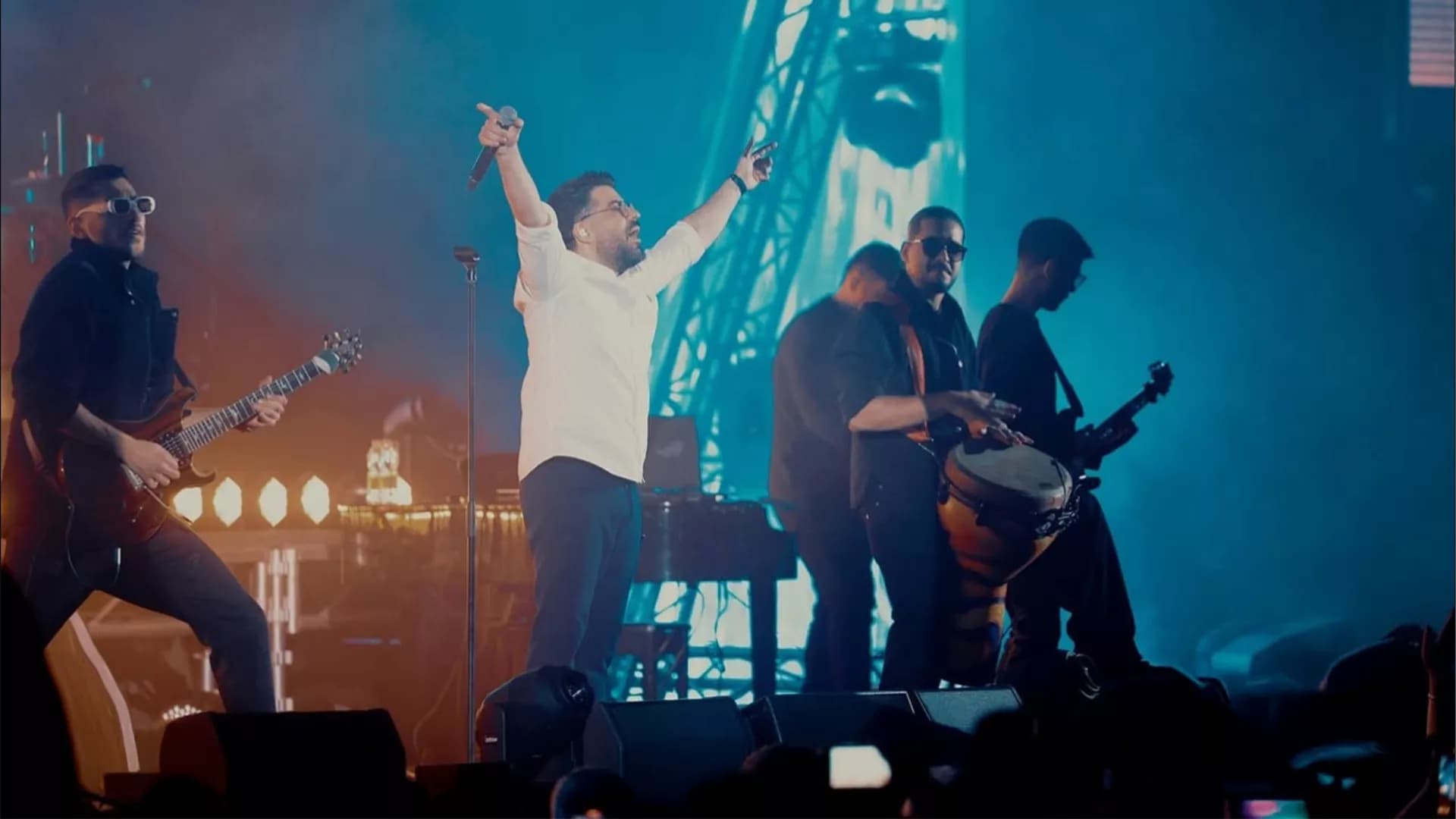 Band performing live on stage at a concert ticketed through Honar Ticket